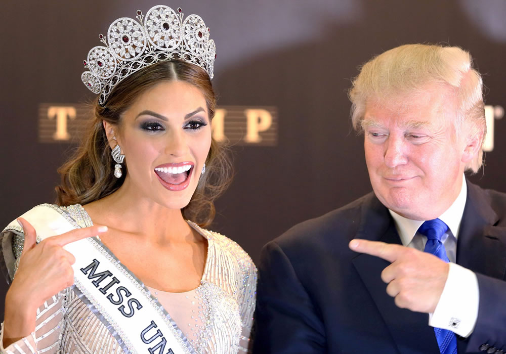 Miss Venezuela 2013, Gabriela Isler (L) poses during a photocall with US business magnate and Miss Universe organizer Donald Trump. Foto: EFE