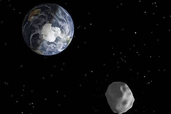 Recreación de la NASA de un asteroide cerca de la Tierra. Foto: EFE
