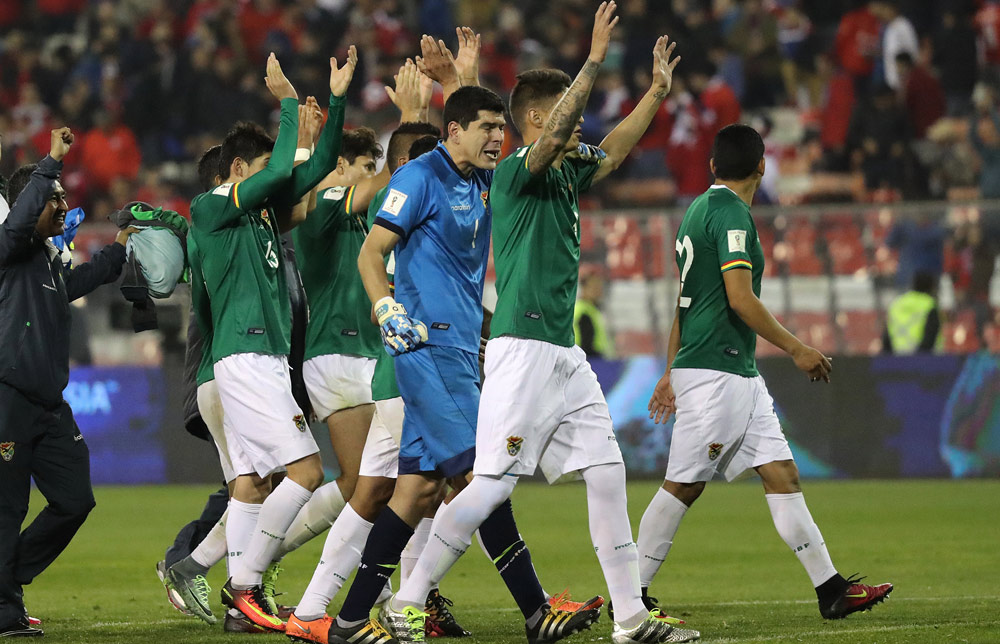 Jugadores de la selección de Bolivia celebran el empate frente a Chile. Foto: EFE