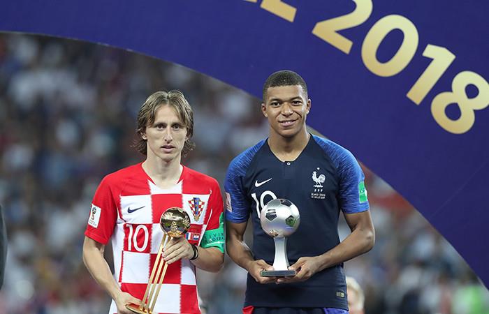 Mbappé y Modric. Foto: AFP